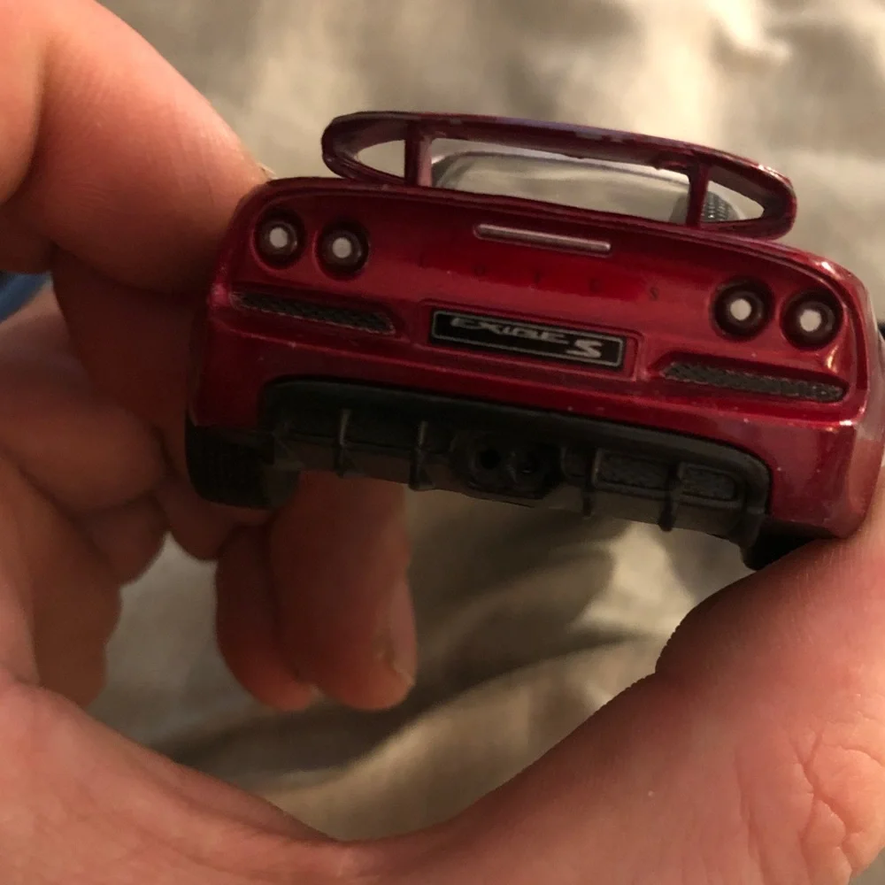 Red and Silver Lotus Exige S pull back action.